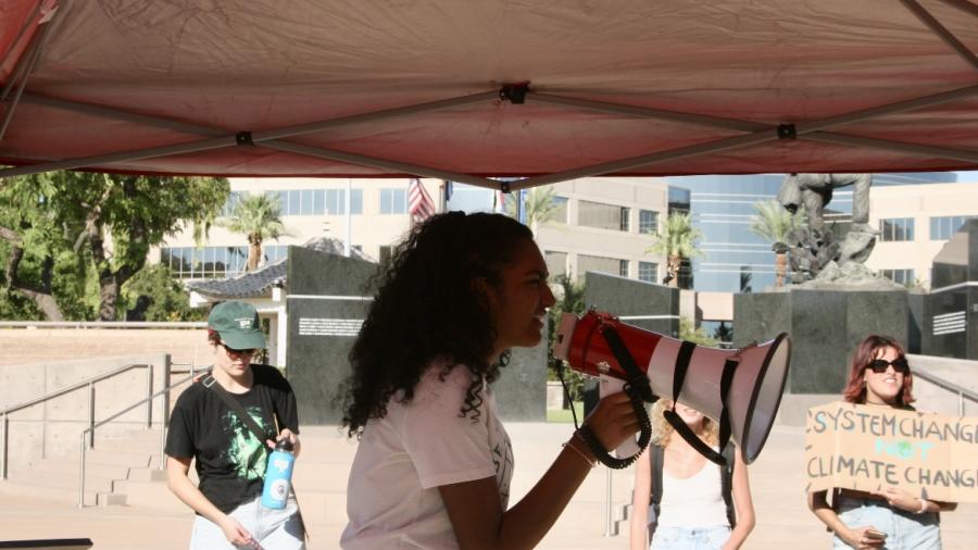 Shaela Patel holding a megaphone